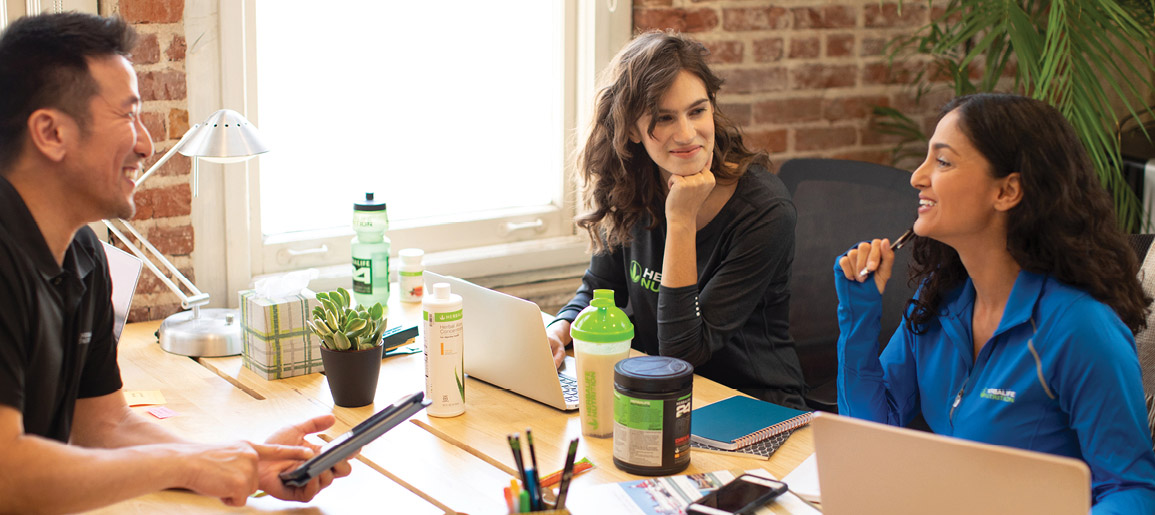 Man Coaching Members About Products