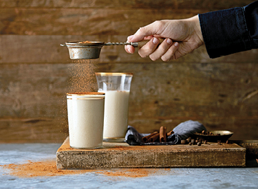 Chocolate Shake With Spices Being Poured On Top