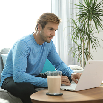 Man On A Laptop With A Shake, Working From Home