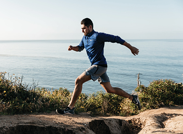 Man Running By The Sea