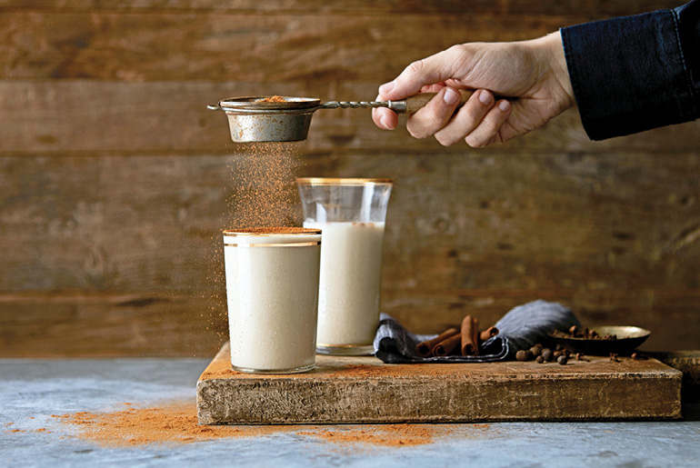 Spices Being Added To Chocolate Shake
