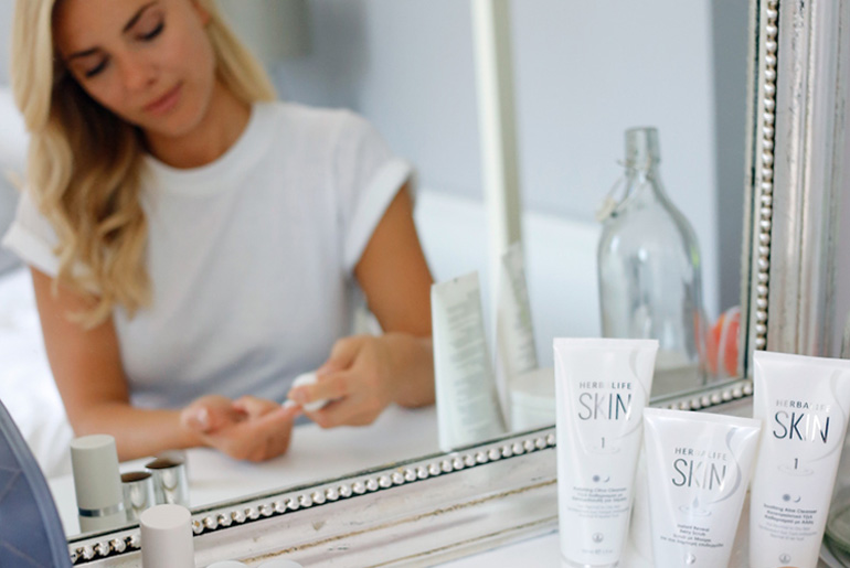 Woman Using Herbalife Skin Products