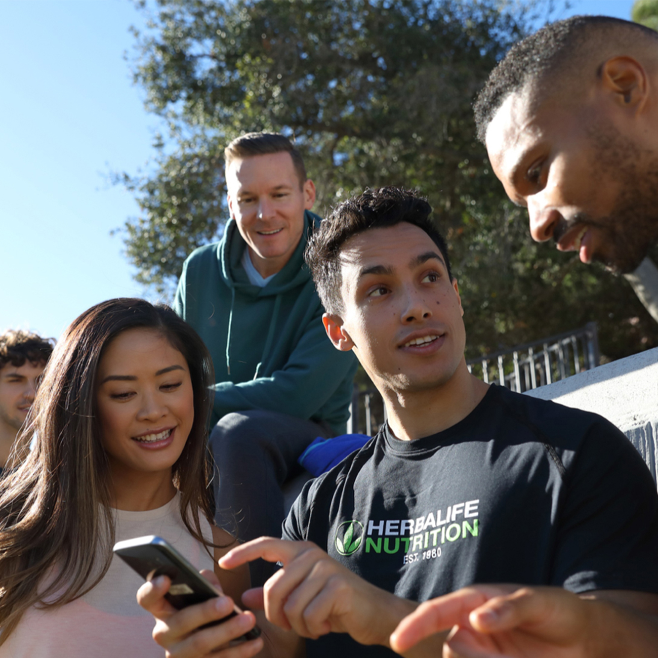 Members Having a Conversation Outdoors