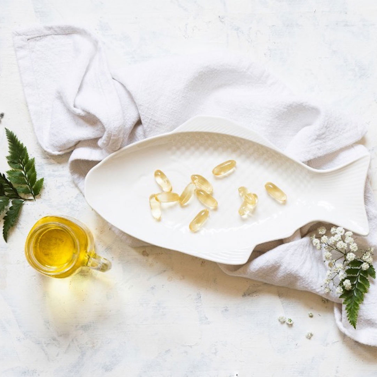 herbalifeline max omega-3 capsules in a fish-shaped bowl